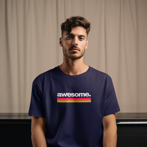Man wearing a navy blue t-shirt with 'awesome.' design sitting in front of a piano.