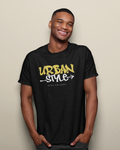 Man wearing a black t-shirt with 'Urban Style' text against a beige background