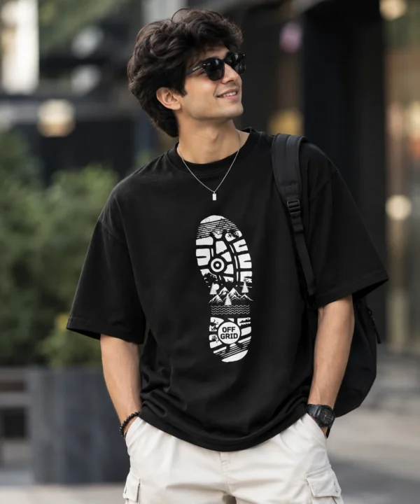 Off Grid Urban Portrait Oversized T-Shirt in black – back view showing the “Off Grid” lettering